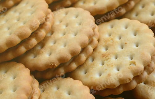 Detailed picture of round sandwich cookies with coconut filling