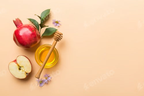 Flat lay composition with symbols jewish Rosh Hashanah holiday attributes on colored background