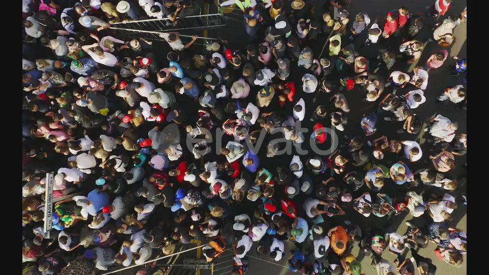 Aerial, crowd and group of people in city on street for concert, music festival